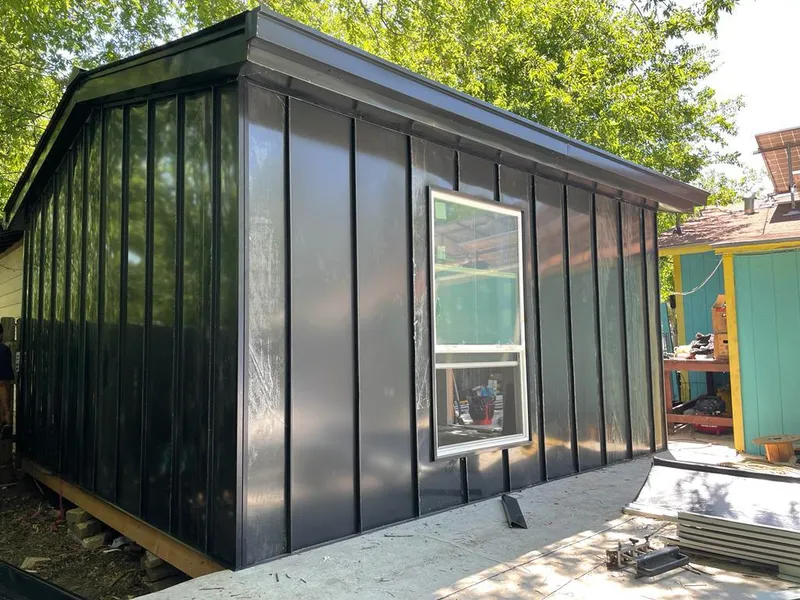 Black standing seam metal wall panels for Metal Roof Installation in Northfield